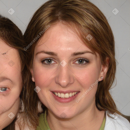 Joyful white young-adult female with medium  brown hair and blue eyes