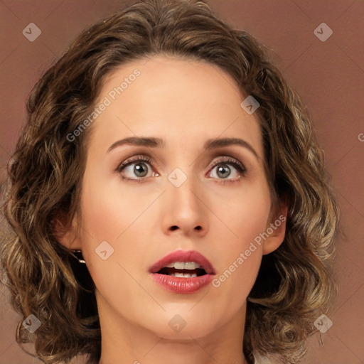 Joyful white young-adult female with medium  brown hair and green eyes