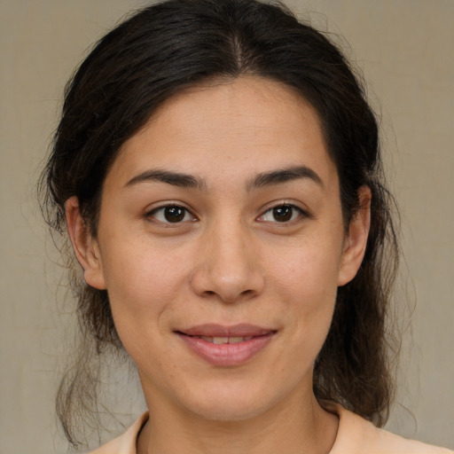 Joyful white young-adult female with medium  brown hair and brown eyes