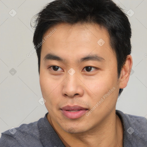 Neutral asian young-adult male with short  black hair and brown eyes