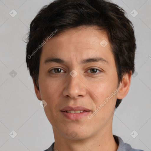 Joyful white adult male with short  brown hair and brown eyes