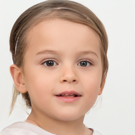 Joyful white child female with medium  brown hair and brown eyes