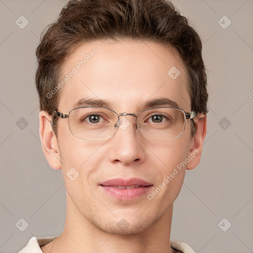 Joyful white adult male with short  brown hair and grey eyes