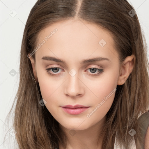 Neutral white young-adult female with long  brown hair and brown eyes