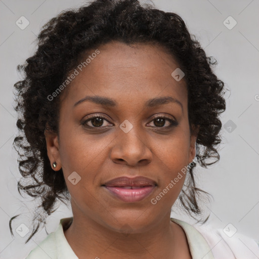 Joyful black young-adult female with medium  brown hair and brown eyes