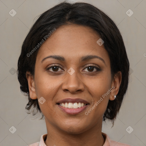 Joyful latino young-adult female with medium  brown hair and brown eyes