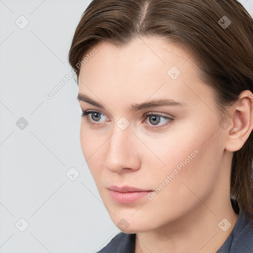 Neutral white young-adult female with medium  brown hair and grey eyes