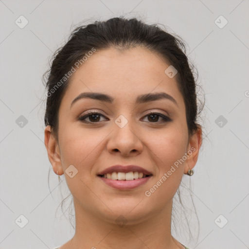 Joyful latino young-adult female with medium  brown hair and brown eyes