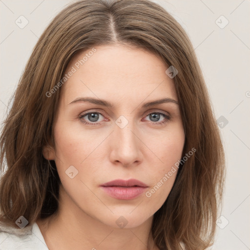 Neutral white young-adult female with medium  brown hair and grey eyes