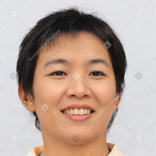 Joyful asian young-adult female with short  brown hair and brown eyes