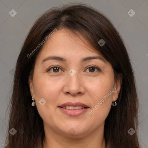 Joyful white adult female with long  brown hair and brown eyes