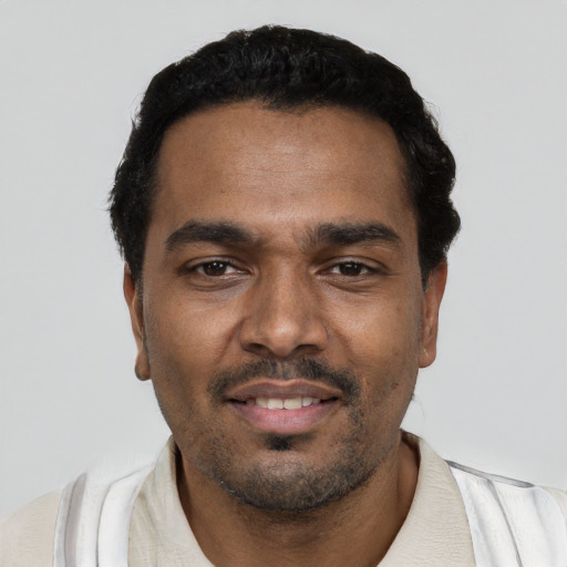 Neutral black young-adult male with short  black hair and brown eyes