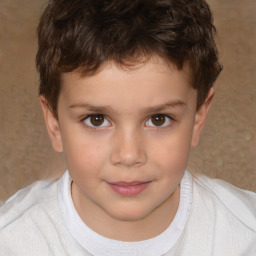 Joyful white child male with short  brown hair and brown eyes