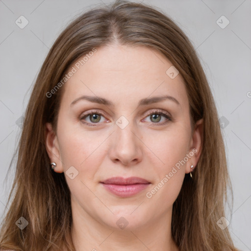 Joyful white young-adult female with long  brown hair and green eyes