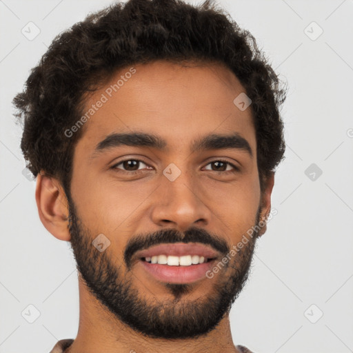 Joyful latino young-adult male with short  brown hair and brown eyes