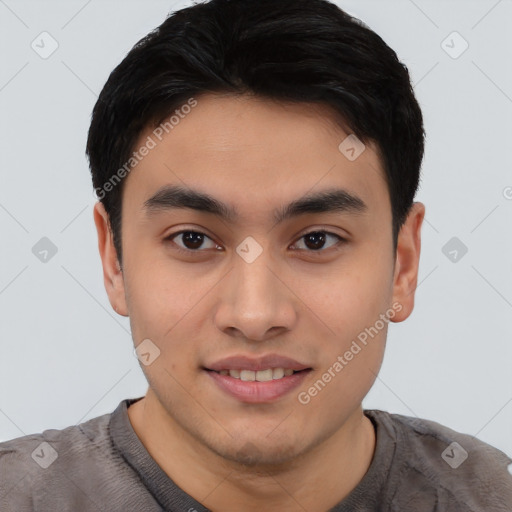 Joyful asian young-adult male with short  black hair and brown eyes