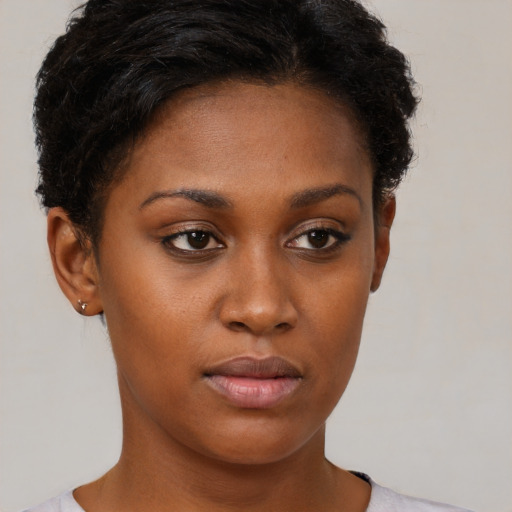 Neutral black young-adult female with short  brown hair and brown eyes