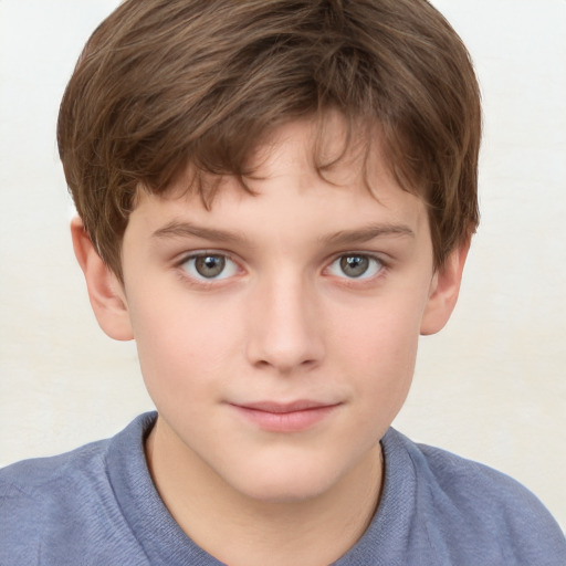 Joyful white child male with short  brown hair and grey eyes