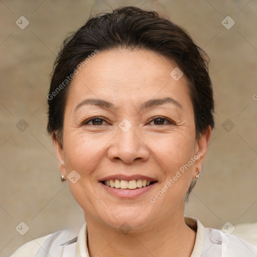 Joyful white adult female with short  brown hair and brown eyes