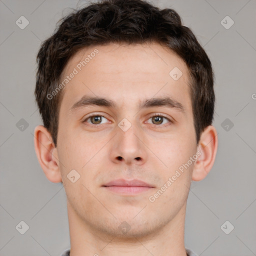 Neutral white young-adult male with short  brown hair and brown eyes