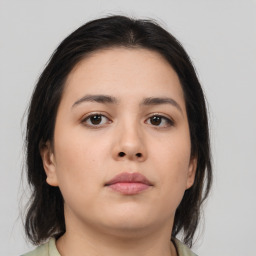 Neutral asian young-adult female with medium  brown hair and brown eyes