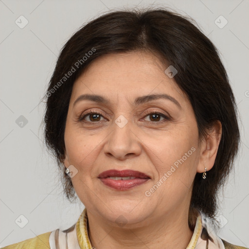 Joyful white adult female with medium  brown hair and brown eyes