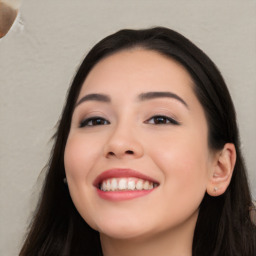 Joyful white young-adult female with long  black hair and brown eyes