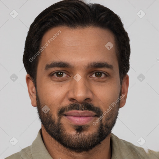 Joyful black young-adult male with short  brown hair and brown eyes