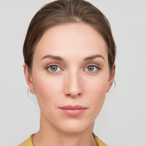 Neutral white young-adult female with medium  brown hair and grey eyes