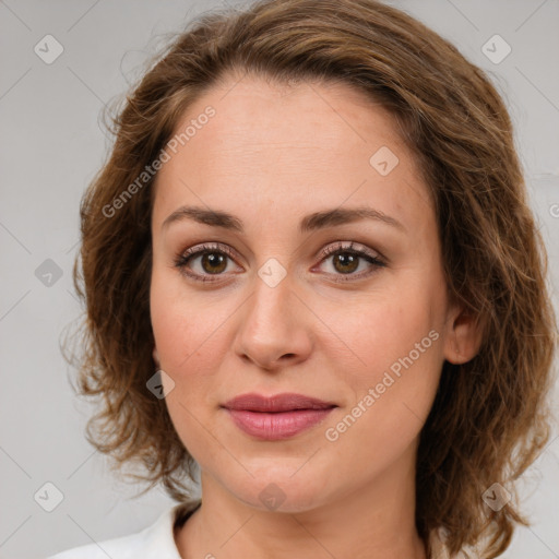 Joyful white young-adult female with medium  brown hair and green eyes