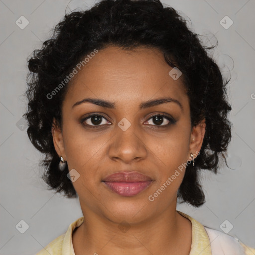 Joyful black young-adult female with medium  brown hair and brown eyes