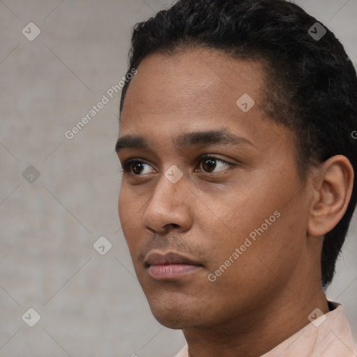 Neutral black young-adult male with short  black hair and brown eyes