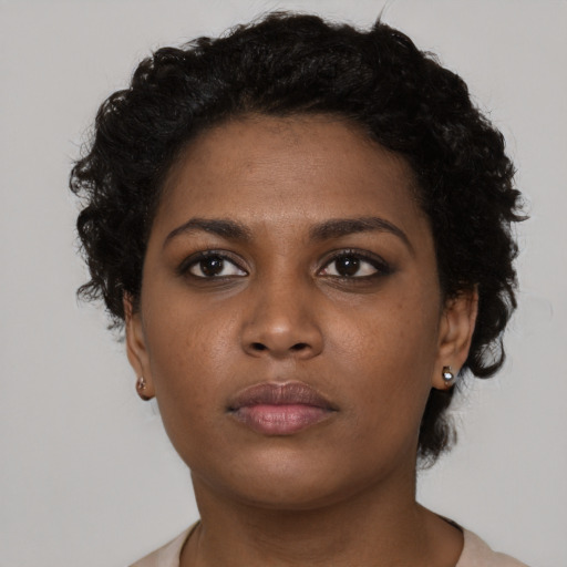 Neutral black young-adult female with short  brown hair and brown eyes