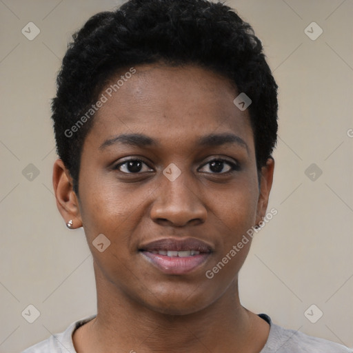 Joyful black young-adult female with short  black hair and brown eyes