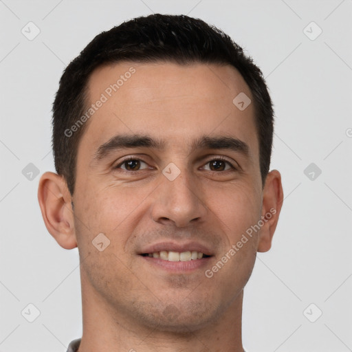 Joyful white young-adult male with short  brown hair and brown eyes