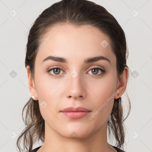 Neutral white young-adult female with medium  brown hair and grey eyes