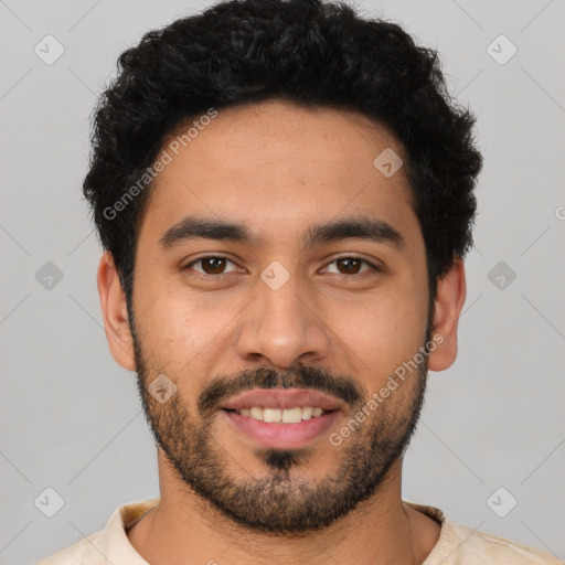 Joyful latino young-adult male with short  black hair and brown eyes