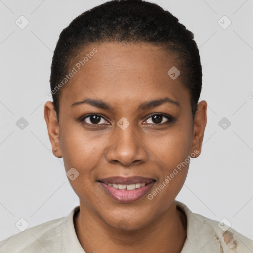 Joyful black young-adult female with short  black hair and brown eyes