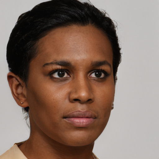 Neutral black young-adult female with short  brown hair and brown eyes