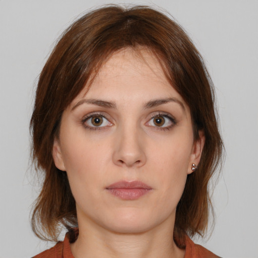 Neutral white young-adult female with medium  brown hair and brown eyes