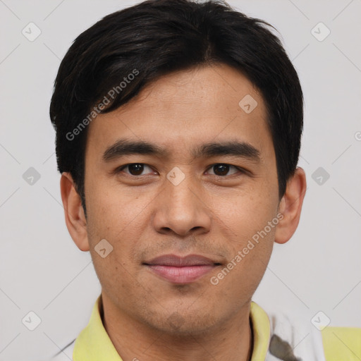 Joyful asian young-adult male with short  black hair and brown eyes
