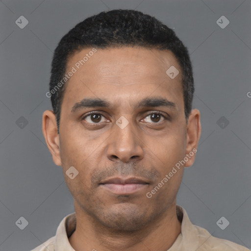 Neutral black young-adult male with short  black hair and brown eyes
