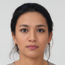 Neutral asian young-adult female with medium  brown hair and brown eyes