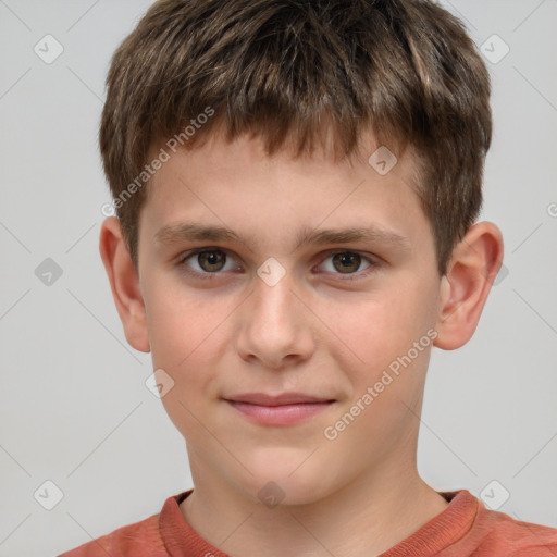 Joyful white child male with short  brown hair and brown eyes