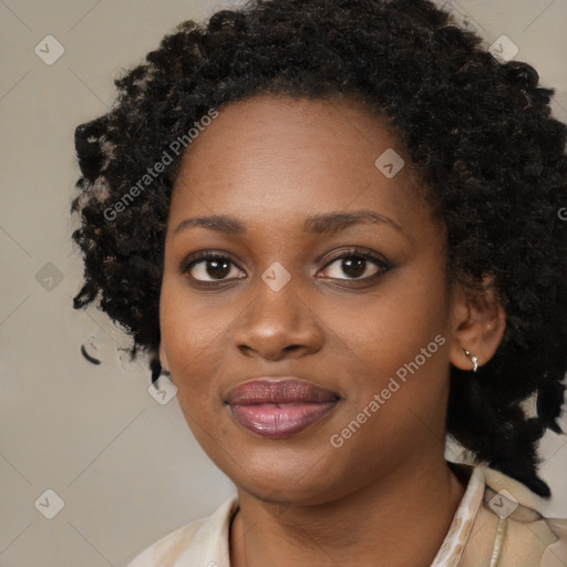 Joyful black young-adult female with medium  black hair and brown eyes