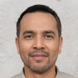 Neutral white adult male with short  black hair and brown eyes