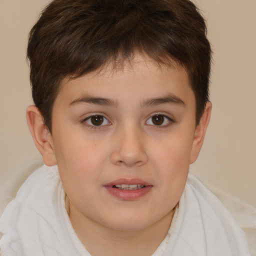 Joyful white child male with short  brown hair and brown eyes