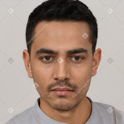 Neutral white young-adult male with short  black hair and brown eyes