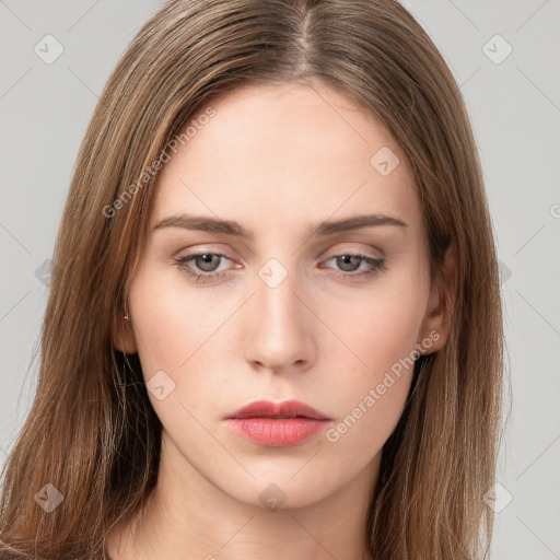 Neutral white young-adult female with long  brown hair and brown eyes