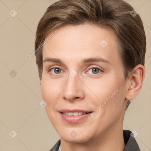 Joyful white young-adult female with short  brown hair and grey eyes